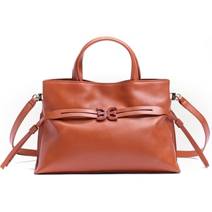 image:imageSam Edelman Poppy Small Drawstring Crossbody HandbagBurnt Orange